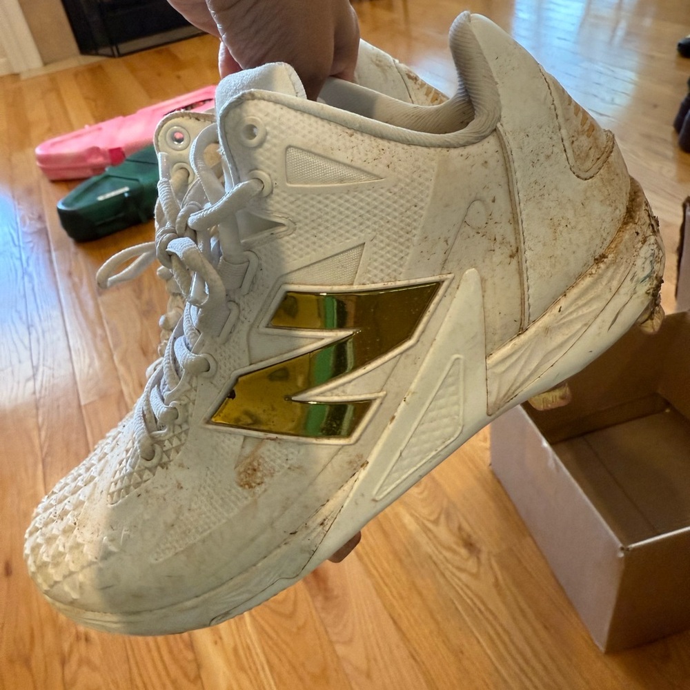 New Balance White and Gold Sneakers